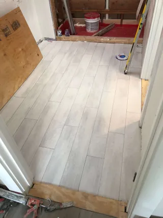 flooring renovation by Infiniker