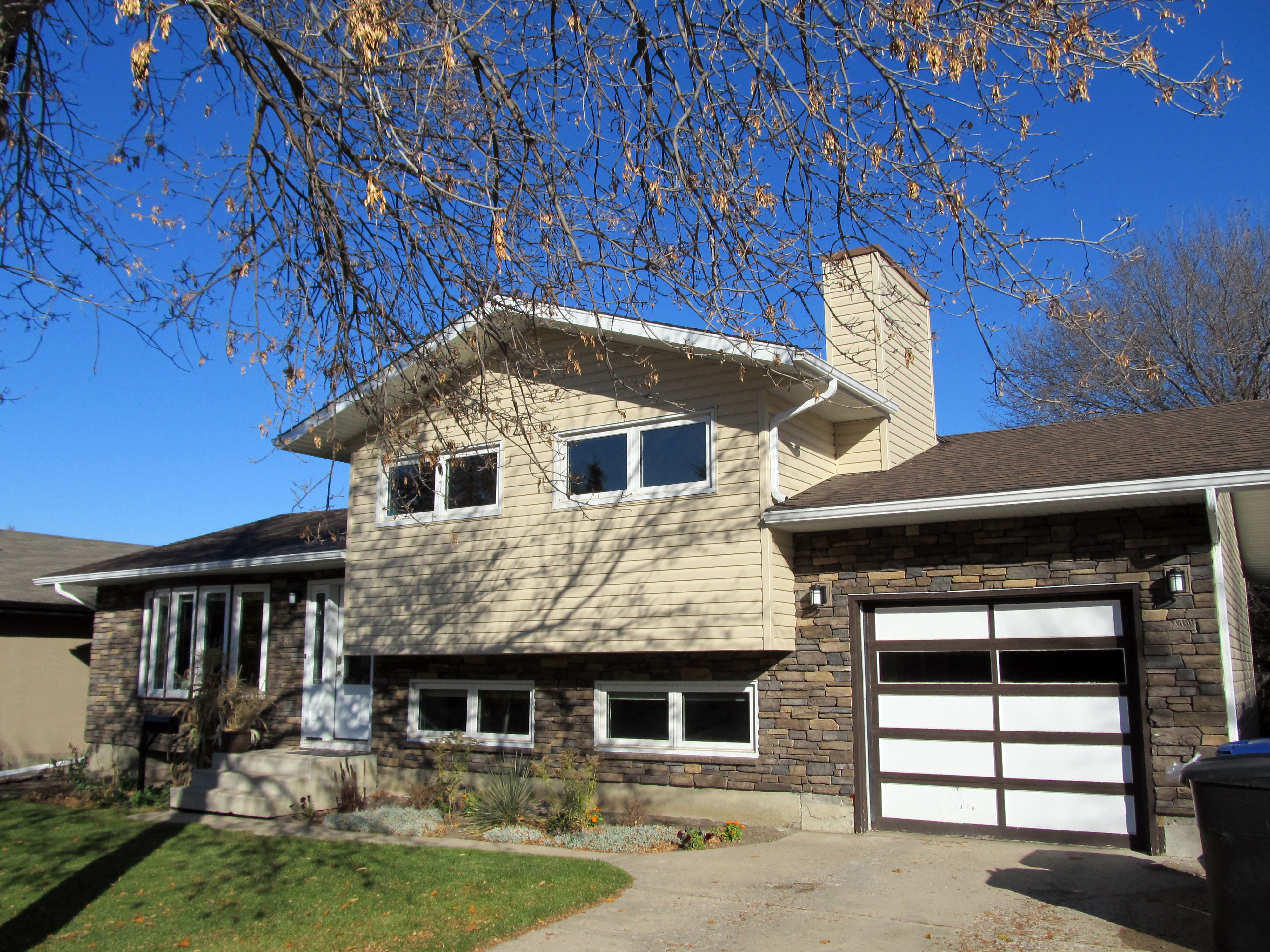 Home exterior with updated siding and trim work